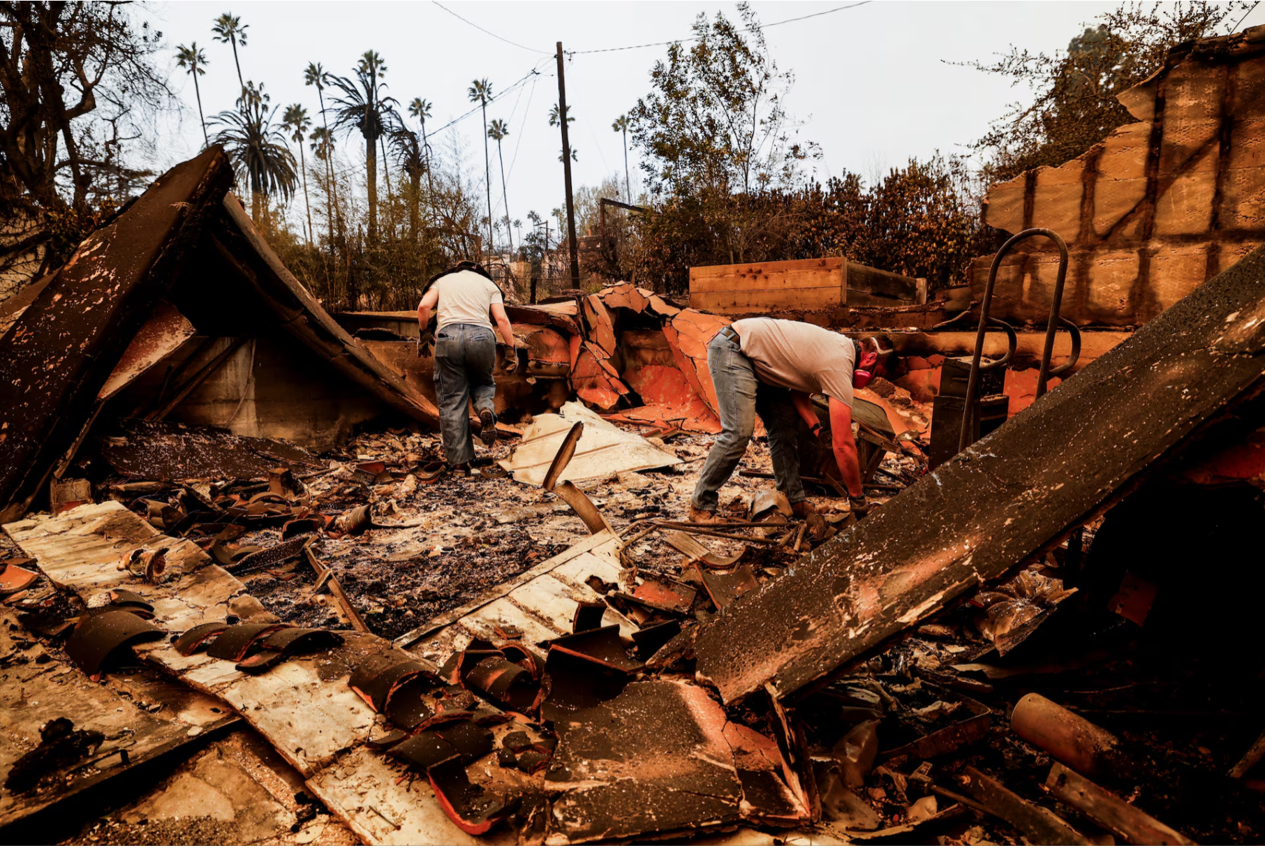 Los Angeles wildfires devour more homes even as fierce winds start to ease