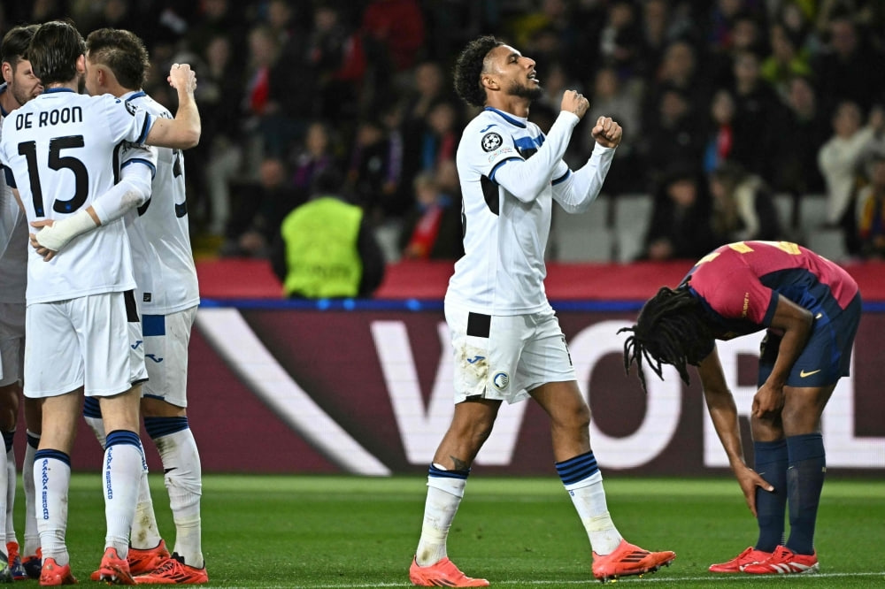 Atalanta’s Ederson Jose Dos Santos Lourenco da Silva celebrates after scoring their first goal.